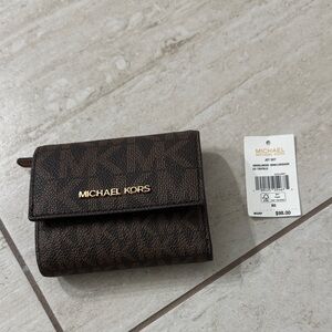 Michael Kors Brown and Dark Brown Monogram Compact trifold ..nwt